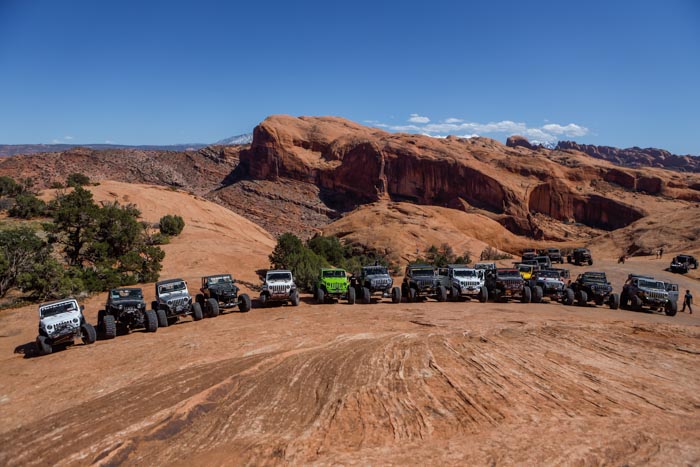 A group of parked cars at the desert
