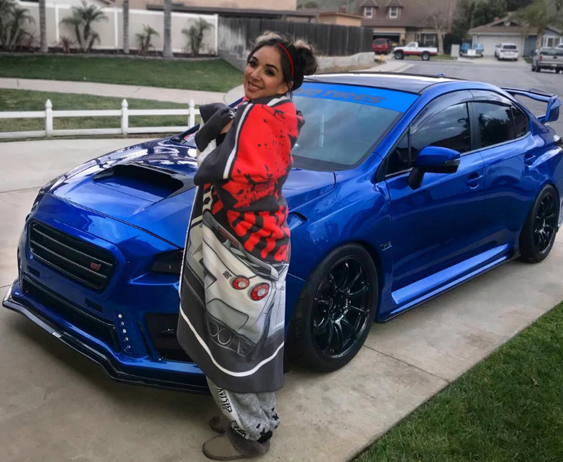 Subaru WRX with upgraded brake rotors and performance brake pads from R1 Concepts