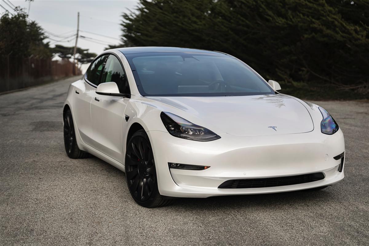 White Tesla Model 3 Performance with Uberturbine wheels
