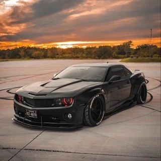 The calm before the storm @b00st_wayne  with a nicely done camaro.